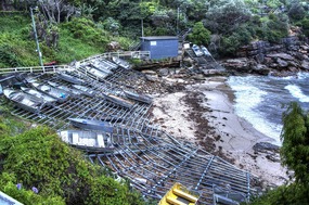 Boats stored along cliffside at Gordon's Bay