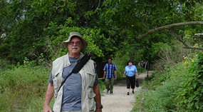 Randy walking along Loh Liang Trail