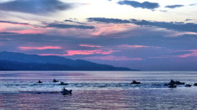 Fishing Boats heading out at Dawn