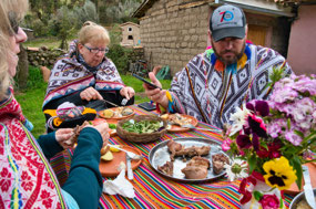 Meal of local food-cuy, trout, potatoes, veggies
