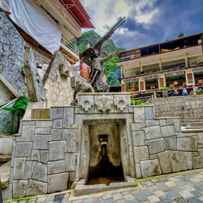 Inca Statue across from Bus Stop