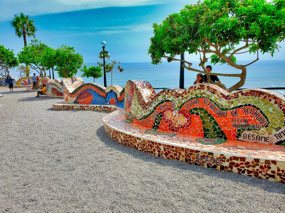 mosaic wall curving along cliff