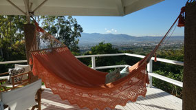 our Airbnb balcony - relaxing with a view