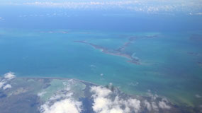 Flying over Belize's reefs