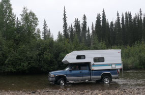 Camping along the River - time to drive through th