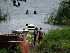 kids playing in the lake