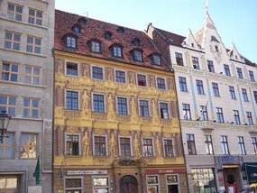 60 houses have surrounded Rynek Sq. from beginning
