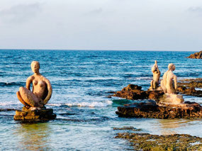 Statues in the water at Can Picafort