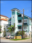 A house that backs onto the beach.