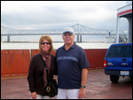 On Algiers Ferry, with bridge across Mississippi R