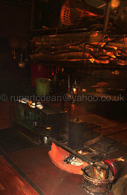 The invention - hot water pipes over the fire