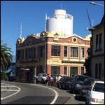 Classic harbour building + picturesque port silo