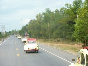 Unusual procession of old cars