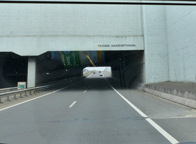 Road goes under canal