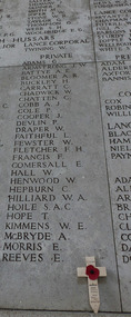 Cross under Ernest Skinner's name