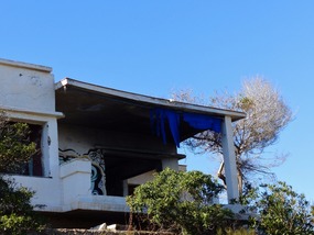 Burnt out deserted villa - cliff top