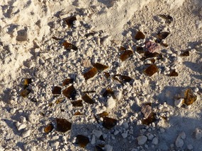 Broken glass on clifftop