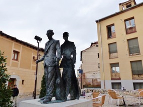 Split statue of local folk song expert