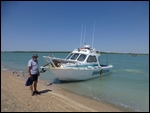 Karumba - Tony L boarding his fishing charter