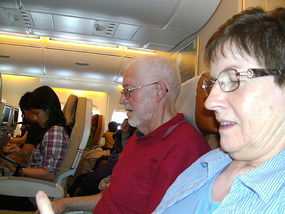 Trev and Sal on the flight to Singapore