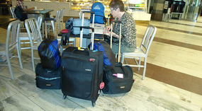Sal looking over maps at Stockholm Central 