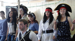 Our Tour Director being held by the Pirates