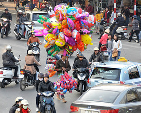 Why Does The Balloon Guy Cross The Road?