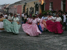 Mayan women dancing in the streets of Antigua.