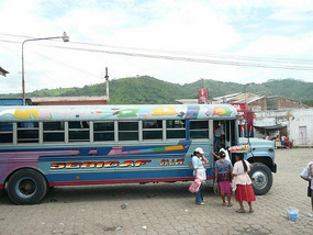 Ladies selling their food on a chickenbus