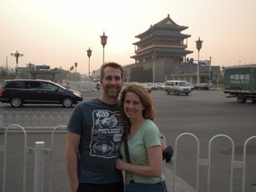 A hazy sunset in front of Tiananman Square