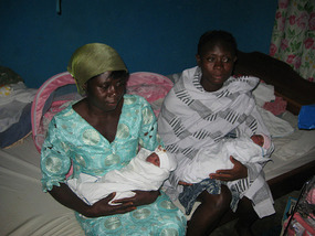 Rahab with newborn twins - boy and girl