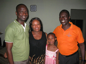 The Dima family with Eshun Plange in orange