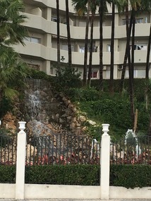 Waterfall to a fountain on our walk