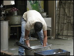 Kitchen porter washing up