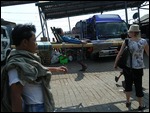 Aga Waits for Bus to Kinpun, Myanmar