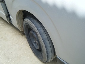 Tire on Front of Van