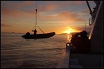 Lifting up the zodiac at sunset