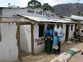 f Storefront for Music and Tailoring