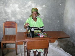 b Modesto Chiwaya with sewing machine