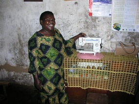 d Jesse Nyelubwe with sewing machine