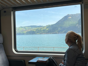 Sharon enjoys Lake Thun scenery from the train.