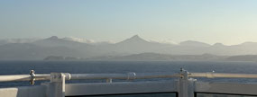 Majorca's mountains visible as ship approaches.