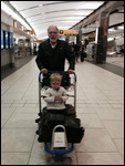 Jaidee with Grandpa at airport